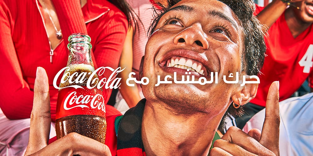 Supporters marocains célébrant avec Coca-Cola