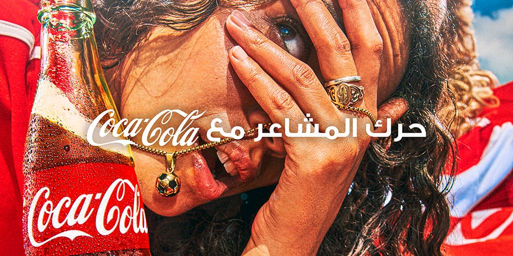 Supporters marocains célébrant avec Coca-Cola